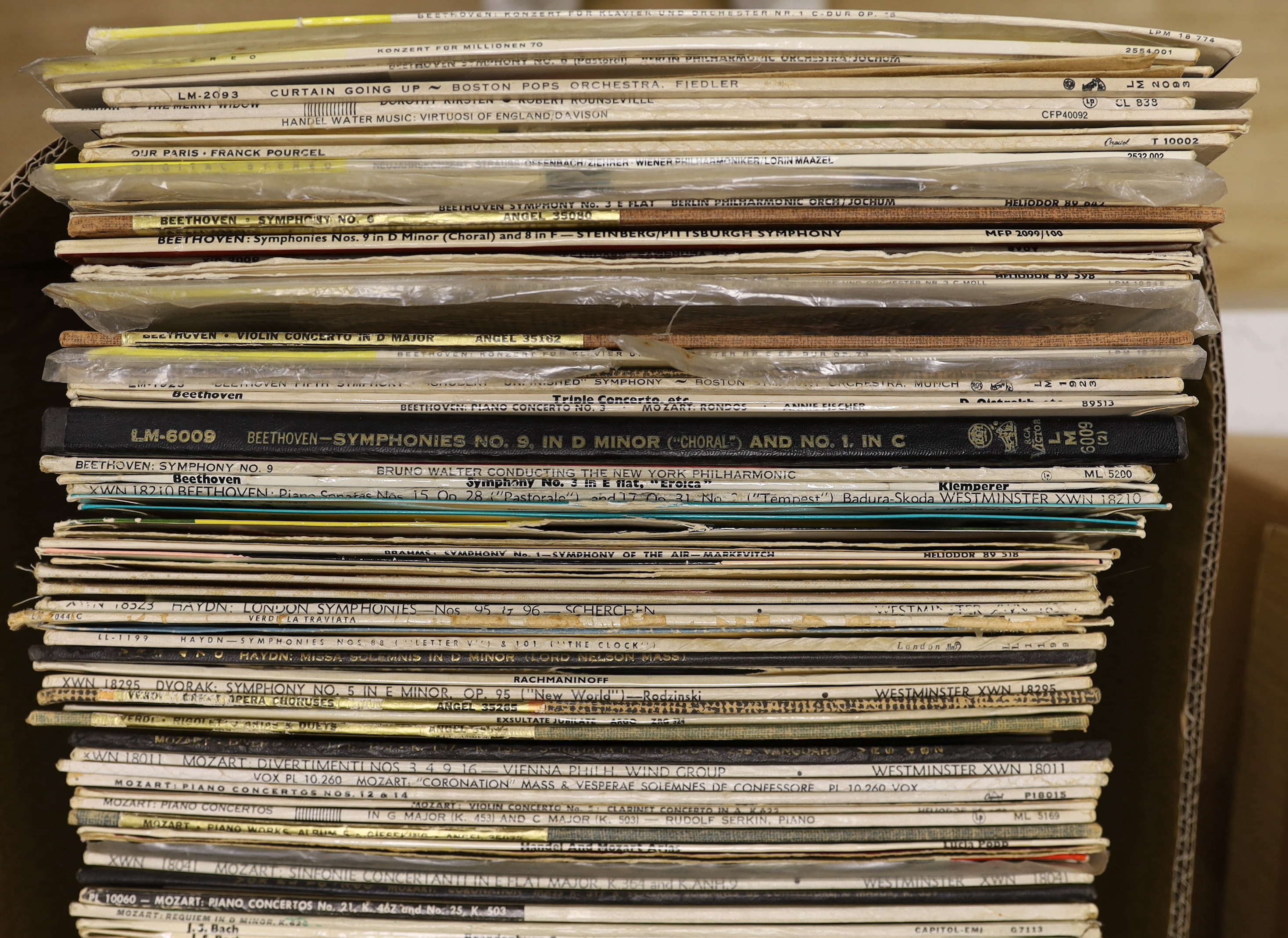 A collection of LPs including 1970's rock, classical recordings, box sets, etc, including; The Beatles, Queen, The Carpenters, Dionne Warwick, ABBA, Dave Brubeck, The Beach Boys, Haydn symphonies, Beethoven symphonies, o